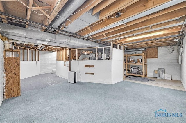 7040 Country Creek Rd, Maumee, OH 43537 - unfinished basement featuring carpet flooring