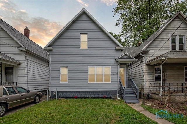 2336 Caledonia St, Toledo, OH 43605 - view of front of house with a lawn