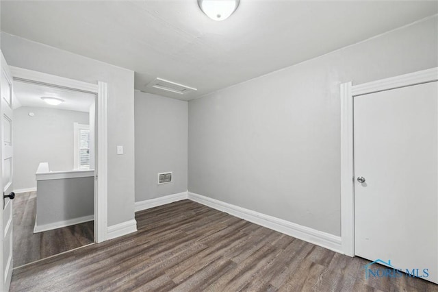 2336 Caledonia St, Toledo, OH 43605 - unfurnished bedroom with attic access and wood finished floors