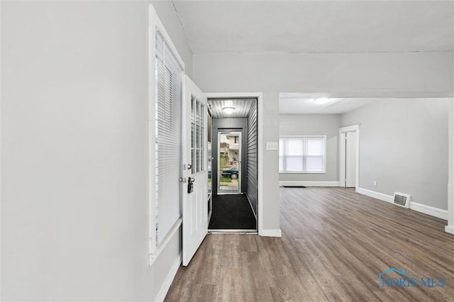 2336 Caledonia St, Toledo, OH 43605 - foyer entrance featuring wood finished floors and baseboards