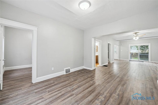 2336 Caledonia St, Toledo, OH 43605 - unfurnished living room with wood finished floors and ceiling fan