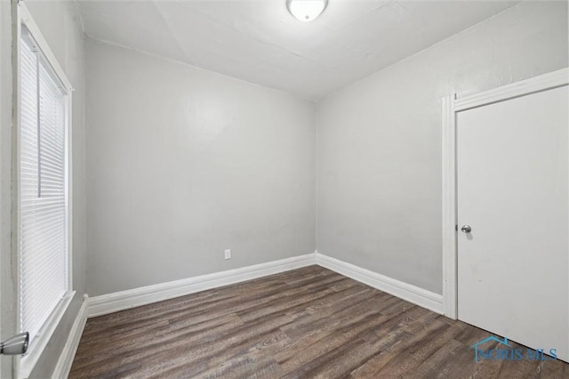 2336 Caledonia St, Toledo, OH 43605 - unfurnished bedroom featuring wood finished floors and a closet