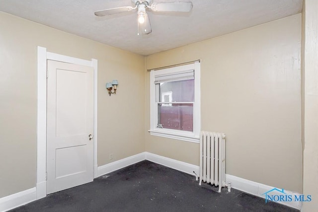 433 Islington St, Toledo, OH 43610 - unfurnished room featuring radiator and a ceiling fan
