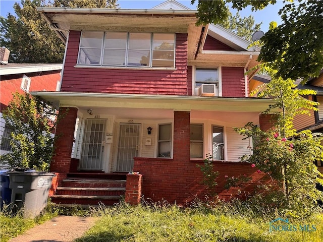 433 Islington St, Toledo, OH 43610 - view of front of property with a porch and cooling unit