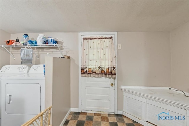 422 Eben Ave, Findlay, OH 45840 - laundry area featuring washing machine and dryer and a textured ceiling