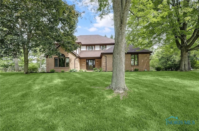 1626 Woodstream Rd, Perrysburg, OH 43551 - view of front of home with a front yard and brick siding