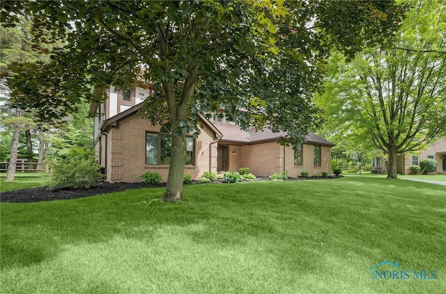 1626 Woodstream Rd, Perrysburg, OH 43551 - view of home's exterior featuring brick siding