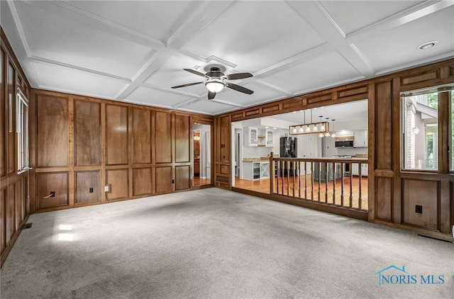 1626 Woodstream Rd, Perrysburg, OH 43551 - unfurnished living room with coffered ceiling, a decorative wall, a ceiling fan, carpet flooring, and beamed ceiling