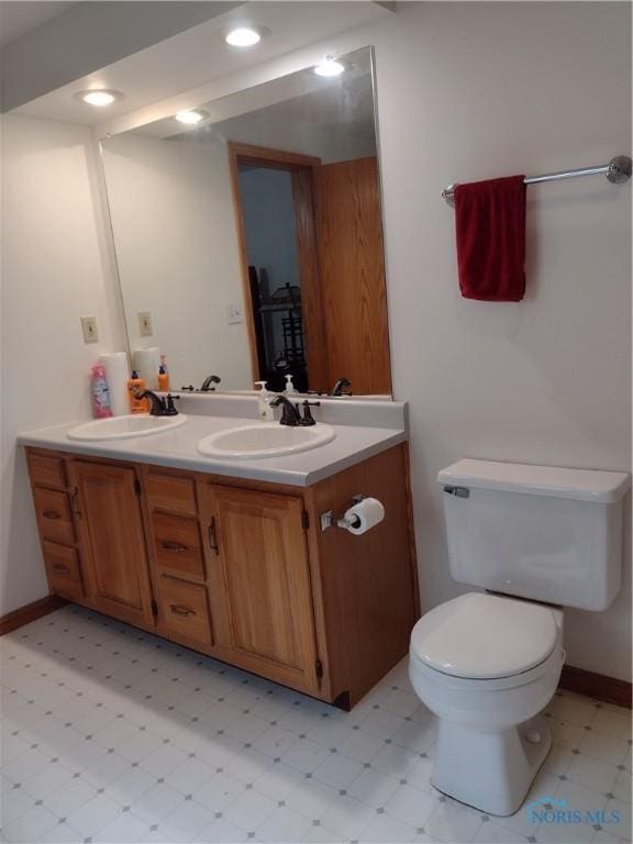 11550 County Road 26th 1, Fayette, OH 43521 - bathroom featuring double vanity and tile patterned floors