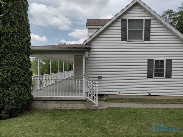 11550 County Road 26th 1, Fayette, OH 43521 - view of property exterior with a lawn and a shingled roof