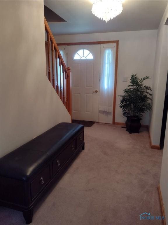 11550 County Road 26th 1, Fayette, OH 43521 - entrance foyer with light carpet, stairway, and a chandelier