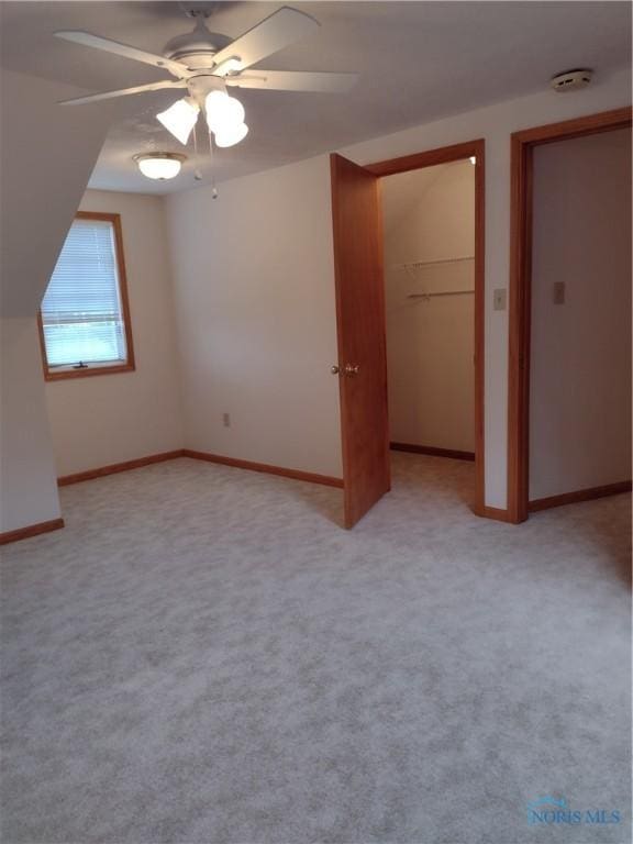 11550 County Road 26th 1, Fayette, OH 43521 - unfurnished bedroom with a spacious closet, ceiling fan, and a closet