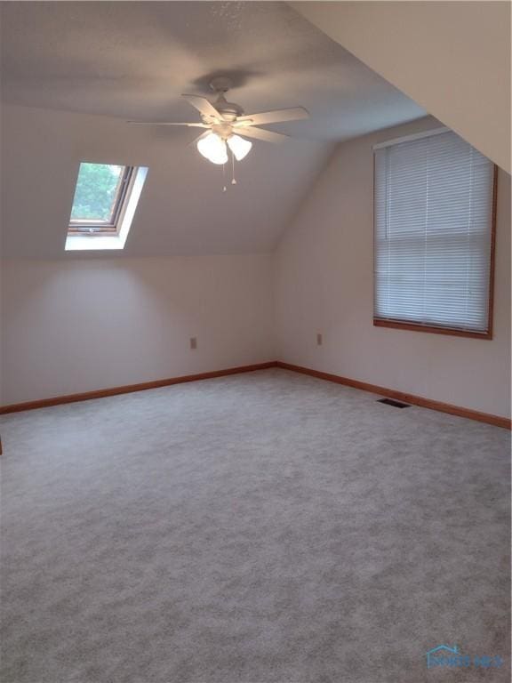 11550 County Road 26th 1, Fayette, OH 43521 - additional living space featuring lofted ceiling, a skylight, ceiling fan, and carpet flooring