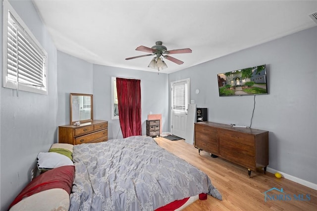 4128 Douglas Rd, Toledo, OH 43613 - bedroom with wood finished floors and ceiling fan