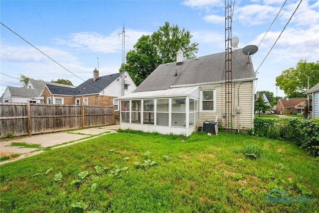 42 California Blvd, Toledo, OH 43612 - back of house with a sunroom and a chimney