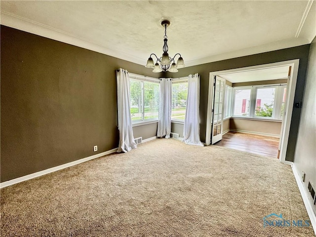 908 E High St, Hicksville, OH 43526 - unfurnished dining area featuring a chandelier, carpet flooring, and ornamental molding