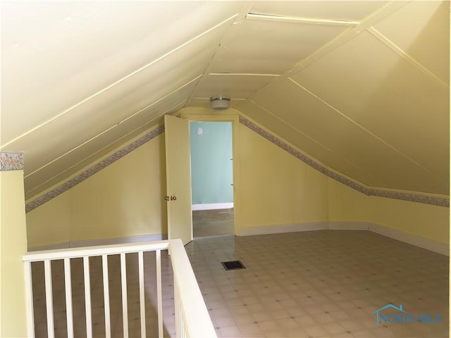1007 Leonard Ct, Fostoria, OH 44830 - additional living space featuring tile patterned floors and lofted ceiling
