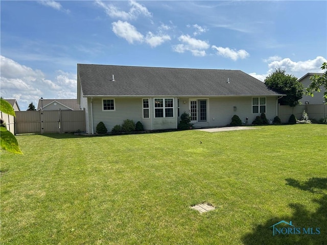 2440 Bluestone Dr, Findlay, OH 45840 - rear view of house featuring a patio area and a gate