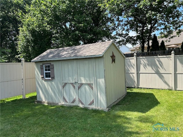 2440 Bluestone Dr, Findlay, OH 45840 - view of shed featuring a fenced backyard