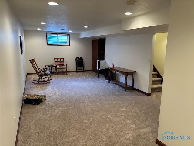 2440 Bluestone Dr, Findlay, OH 45840 - sitting room with carpet floors, recessed lighting, and stairway