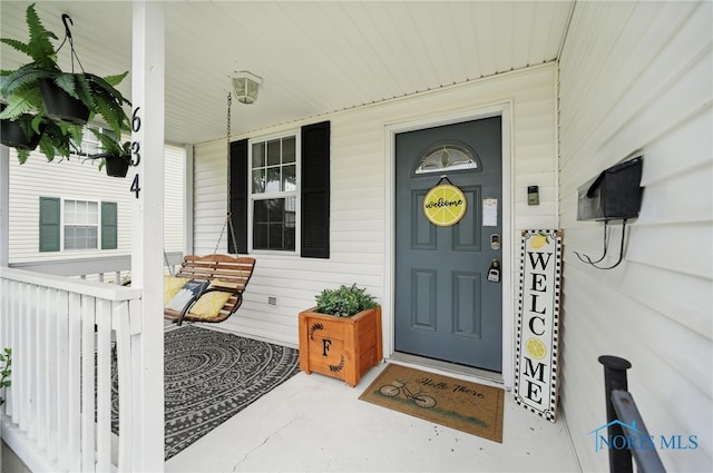 634 Cherry St, Findlay, OH 45840 - doorway to property featuring a porch