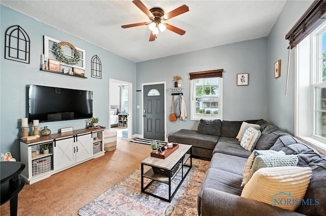 634 Cherry St, Findlay, OH 45840 - living room with ceiling fan and light colored carpet