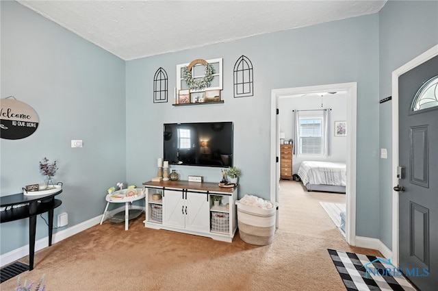 634 Cherry St, Findlay, OH 45840 - living area featuring carpet and a textured ceiling