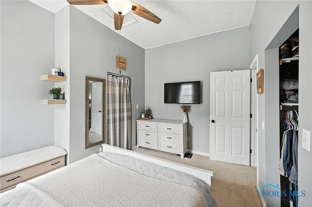 634 Cherry St, Findlay, OH 45840 - bedroom featuring light carpet, a textured ceiling, and a ceiling fan