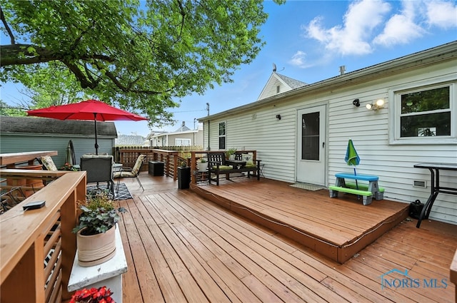 634 Cherry St, Findlay, OH 45840 - wooden terrace with outdoor dining space