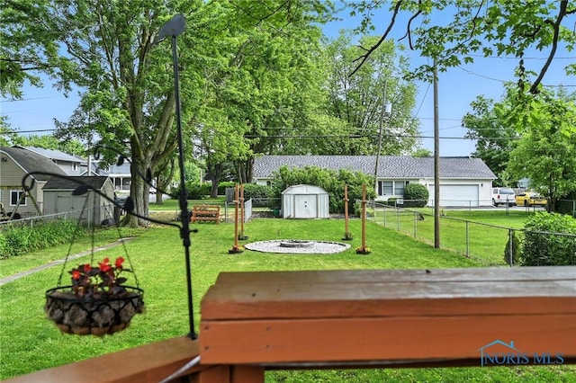 634 Cherry St, Findlay, OH 45840 - view of home's community with a storage shed and an outdoor fire pit