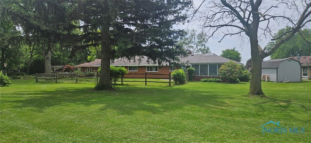 4010 Wreford Ct, Toledo, OH 43614 - view of yard with a storage unit
