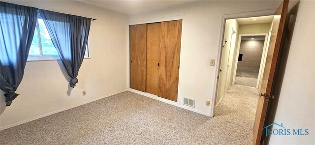 4010 Wreford Ct, Toledo, OH 43614 - unfurnished bedroom featuring carpet and a closet