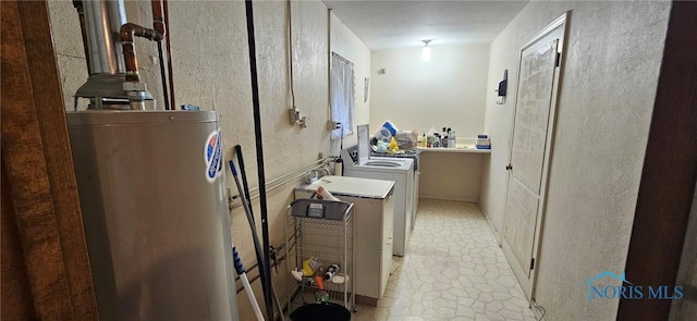 4010 Wreford Ct, Toledo, OH 43614 - bathroom featuring water heater and washer and dryer