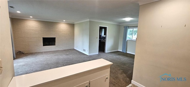 4010 Wreford Ct, Toledo, OH 43614 - unfurnished living room with carpet flooring, a brick fireplace, ornamental molding, and recessed lighting