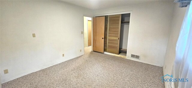 4010 Wreford Ct, Toledo, OH 43614 - unfurnished bedroom featuring carpet flooring and a closet