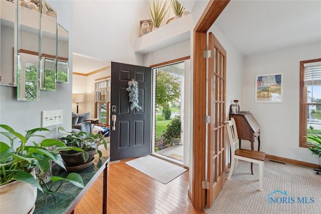 2393 Woods Edge Rd, Perrysburg, OH 43551 - entryway featuring hardwood / wood-style flooring and baseboards