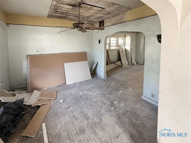 1534 Indiana Ave, Toledo, OH 43607 - unfurnished dining area featuring arched walkways and a ceiling fan