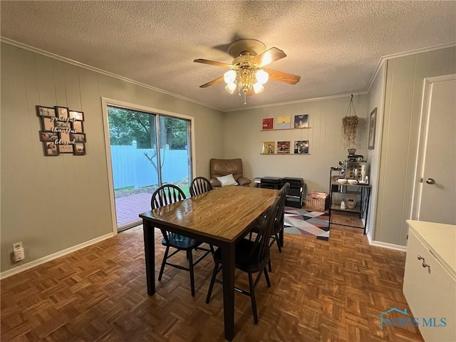 4409 Merry Ln, Toledo, OH 43615 - dining room featuring crown molding, a ceiling fan, and a textured ceiling