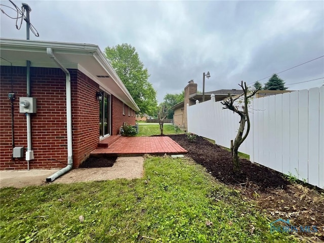 4409 Merry Ln, Toledo, OH 43615 - view of yard featuring a wooden deck