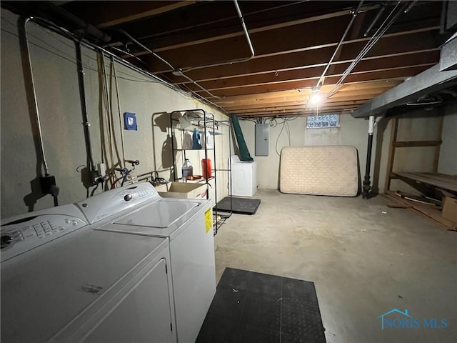 4409 Merry Ln, Toledo, OH 43615 - unfinished below grade area with washer and clothes dryer and electric panel