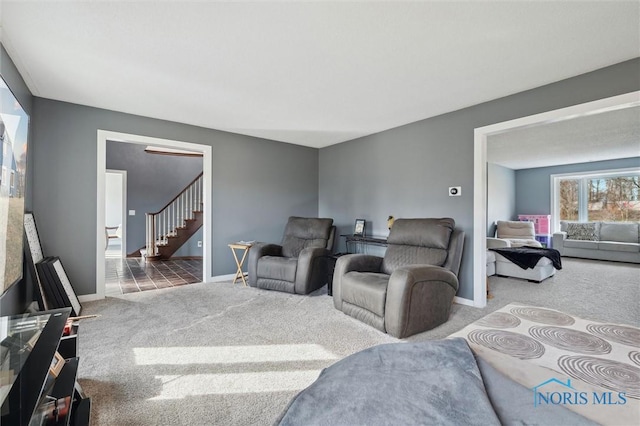 7106 Country Creek Rd, Maumee, OH 43537 - living room featuring carpet and stairway
