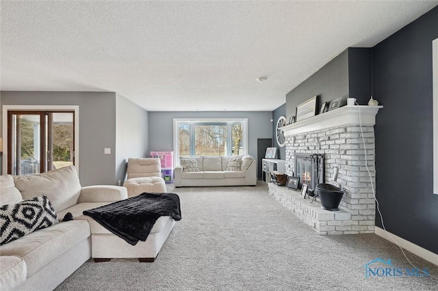 7106 Country Creek Rd, Maumee, OH 43537 - carpeted living area featuring a textured ceiling and a fireplace