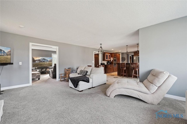 7106 Country Creek Rd, Maumee, OH 43537 - living room with light colored carpet and a textured ceiling