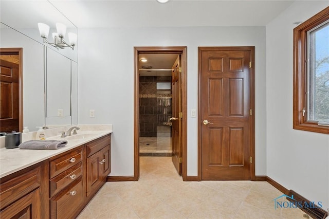 7106 Country Creek Rd, Maumee, OH 43537 - bathroom with vanity, tiled shower, and tile patterned flooring
