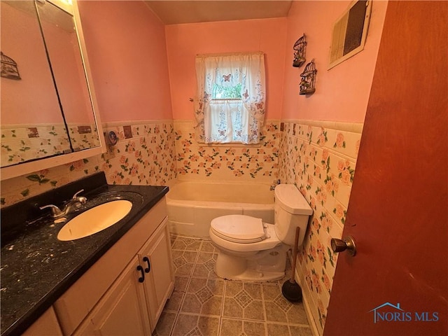 6913 Brint Rd, Sylvania, OH 43560 - full bath featuring wainscoting, a bath, tile patterned flooring, vanity, and tile walls