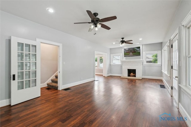 108 Western Ave, Findlay, OH 45840 - unfurnished living room with wood finished floors, healthy amount of natural light, recessed lighting, a brick fireplace, and a ceiling fan
