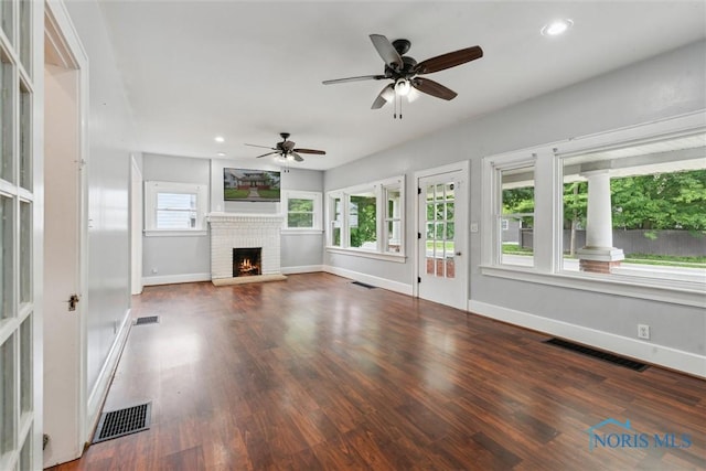 108 Western Ave, Findlay, OH 45840 - unfurnished living room with ceiling fan, a brick fireplace, wood finished floors, and recessed lighting