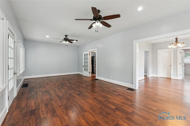 108 Western Ave, Findlay, OH 45840 - spare room with recessed lighting, wood finished floors, a chandelier, and ceiling fan