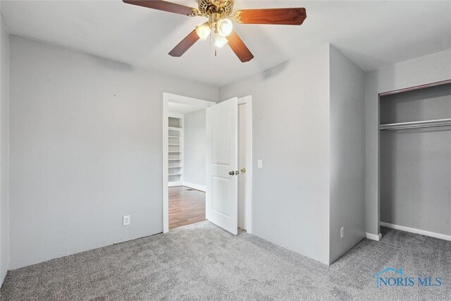 108 Western Ave, Findlay, OH 45840 - unfurnished bedroom featuring carpet, a closet, and ceiling fan