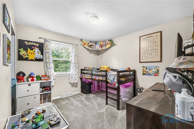 616 Normandie Blvd, Bowling Green, OH 43402 - carpeted bedroom with a textured ceiling and baseboards
